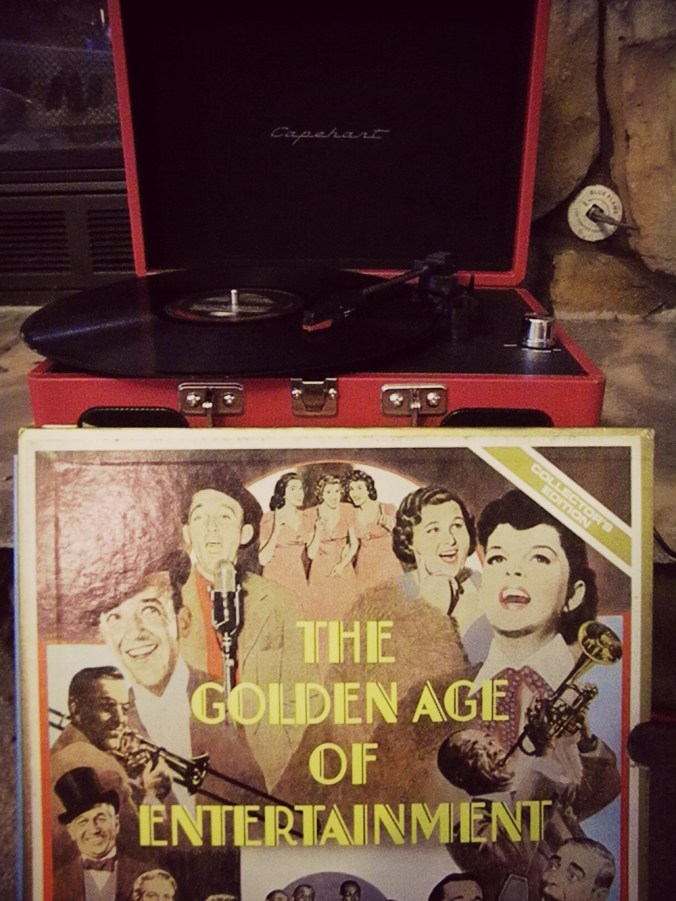 We got a little portable record player last weekend, and I've been loving it!